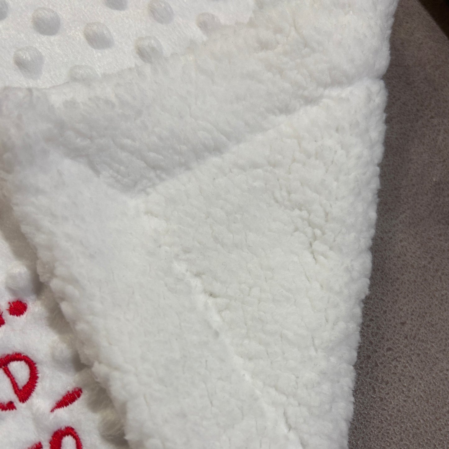 white bobble comforter tag